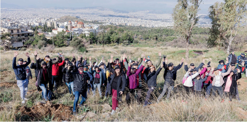 Photo of people tree planting on Mount Ymittos with Newrest